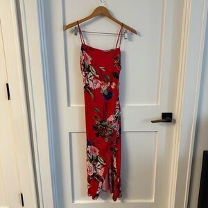 Red floral woven midi dress with self covered button detail at front slit